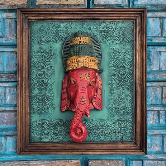 Hand-carved wooden Ganesha wall decor in green and red, rustic antique style, measuring 16.75 inches in height, ideal for spiritual or home decor.