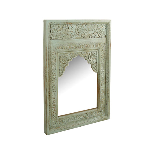 Antique-style mirror with intricate floral carvings and a rustic wood finish